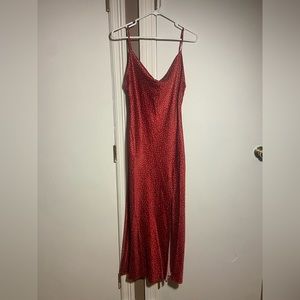 Long red and white polka dot slip dress